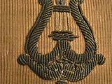 an image of a close up of a piece of cloth with a crown on it