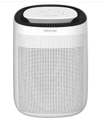 un purificateur d'air blanc posé sur une table blanche