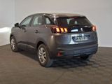 a small car that is parked in a room