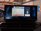 a picture of a car dashboard with a camera mounted on it
