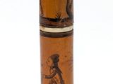 a tall vase with a picture of a man and a woman on it