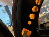 a close up of a car ' s dashboard with buttons on it