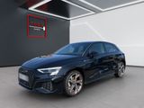 a blue audi rs4 is parked in a garage
