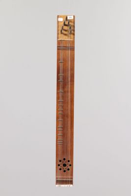 an image of a wooden instrument with a white background