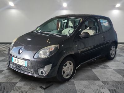 a picture of a small black car parked in a garage