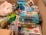 a cardboard box full of toys for sale in a store