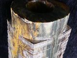 a vase that is sitting on a blue cloth