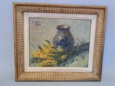tableau représentant un vase orné de fleurs jaunes, dans un cadre doré