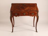 Bureau de pente de forme mouvementée en placage de palissand…