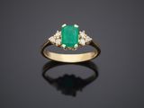 an emerald and diamond ring