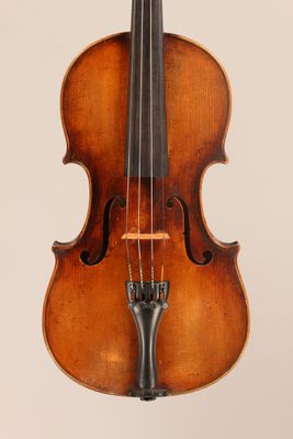 an old violin with a bow on a white background
