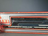 a box with a train in it and a box with a train in it