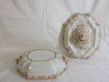 two pieces of porcelain on a white surface