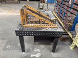 a picture of a metal work bench in a warehouse