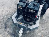 an image of a tow truck with a water pump attached to it