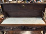 a bed that is sitting on a table in a room