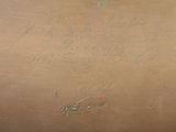 a brown box with writing on it sitting on a table