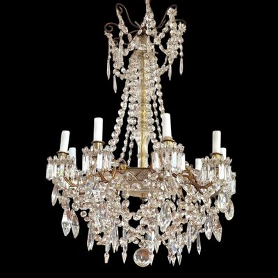 an image of a chandelier made of glass and metal