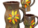 three vases that have been decorated with flowers on them
