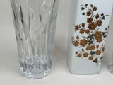 three vases sitting next to each other on a table