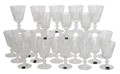a lot of wine glasses that are sitting on the table