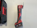 two tools are sitting on a table next to each other