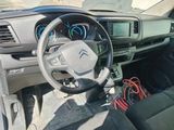 a car dashboard with a steering wheel and a dash board