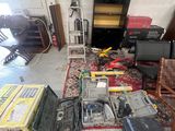 a lot of electronics that are sitting on the floor