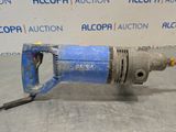 an image of a drill on a table