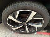 a close up of a tire on a car