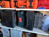 many different types of tools on a shelf