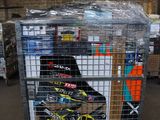 a metal cart with a bunch of skis in it