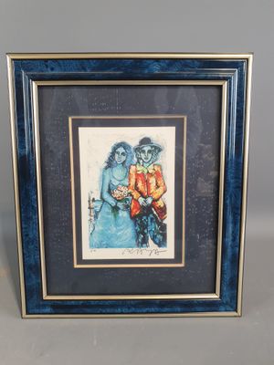 an image of a framed picture of a man and a woman