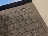 a close up of a laptop with a keyboard on it