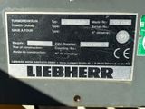 a label on the back of a machine that is sitting on the ground