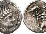 a silver coin with a head of a man and a woman on it