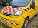 a yellow van with a red and white stripe painted on it