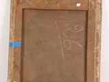 an old picture frame with a drawing of a person on it