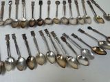 a lot of spoons that are sitting on a table