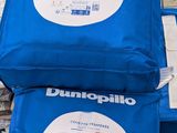 two blue bags that are on top of each other