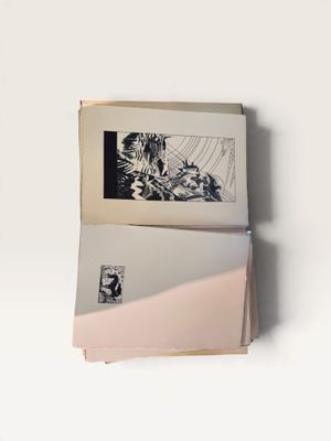 an open book sitting on top of a table next to a white wall