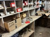 a room with a lot of boxes and boxes on the shelves