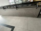 a counter that has a bunch of items on it