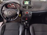 the interior of a car with a steering wheel, dashboard, and dash board