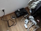 a room with a lot of wires and cords on the floor