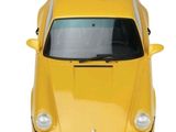 yellow sports car on a white background with a black roof