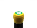 a bottle of wine that is sitting on a table