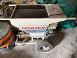 une petite machine qui se trouve dans le garage