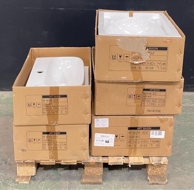 three boxes stacked on top of each other on a pallet