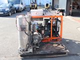 a machine that is sitting in the middle of a parking lot